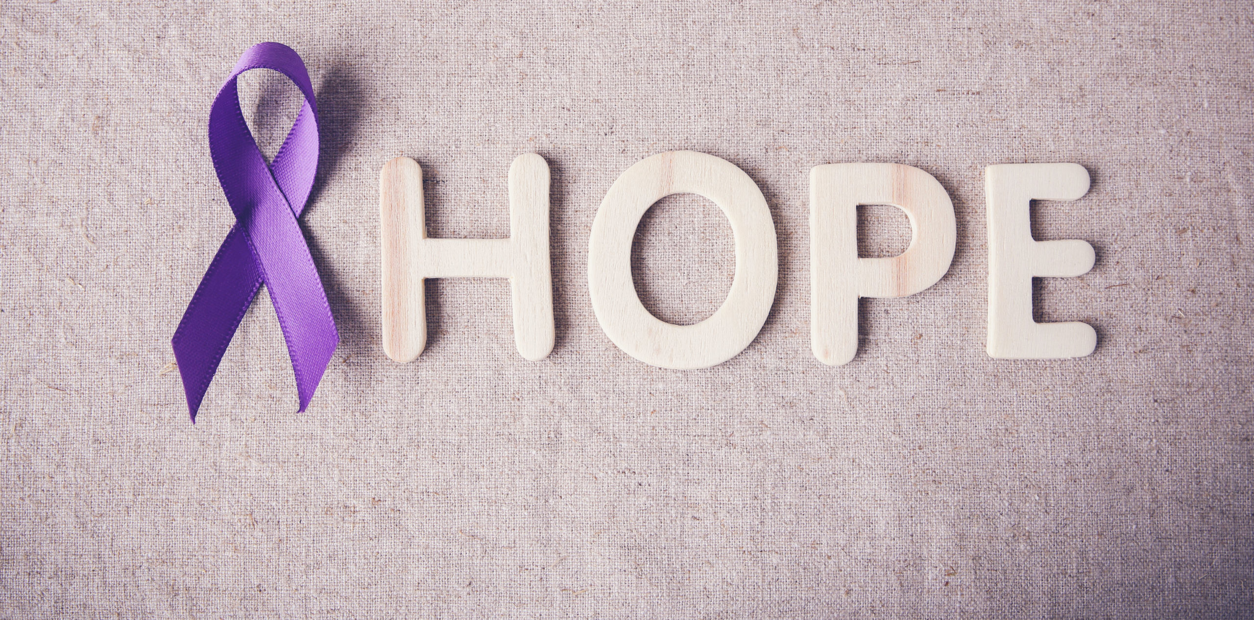 Purple ribbon with HOPE wooden letter, toning, Alzheimer's disease, Pancreatic cancer, Epilepsy awareness, Hodgkin's Lymphoma awareness